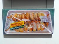 a painting of a tray of food on a wall
