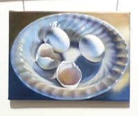 a painting of eggs in a bowl on display