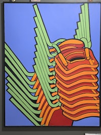 a painting with a red, orange, and green design