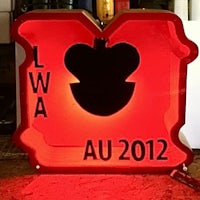a red sign with the word lwa au 2012 on it